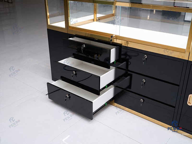 glass jewelry showcase for retail stores with gold frame and black bas