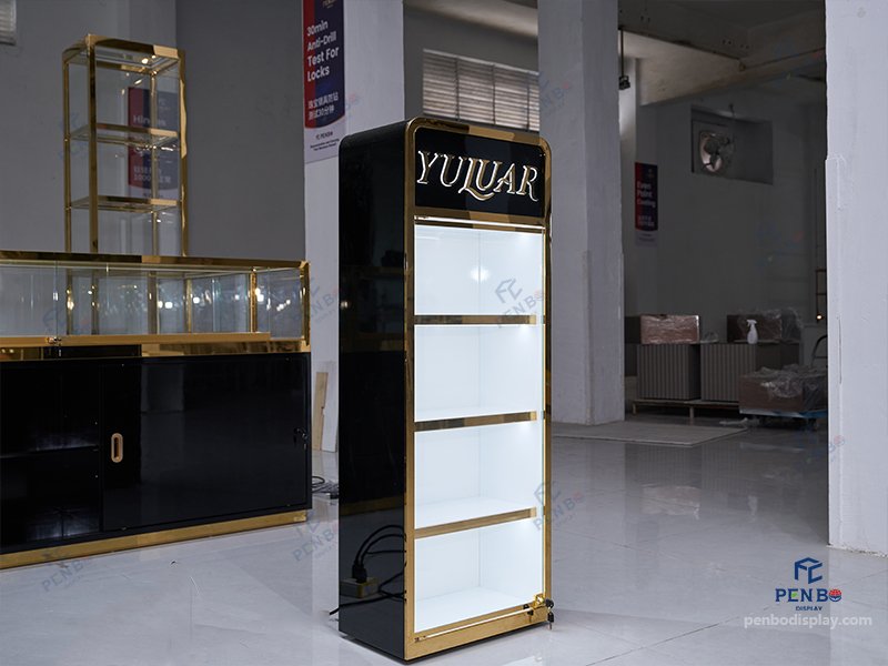 glass jewelry showcase for retail stores with gold frame and black bas