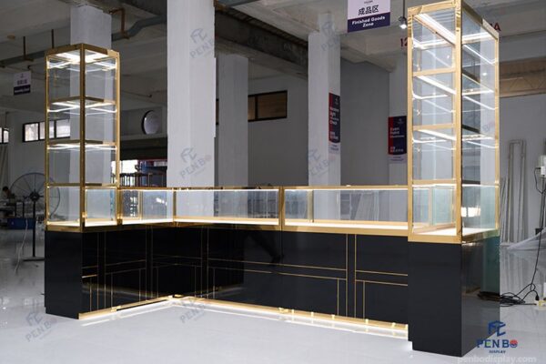 glass jewelry showcase for retail stores with gold frame and black bas