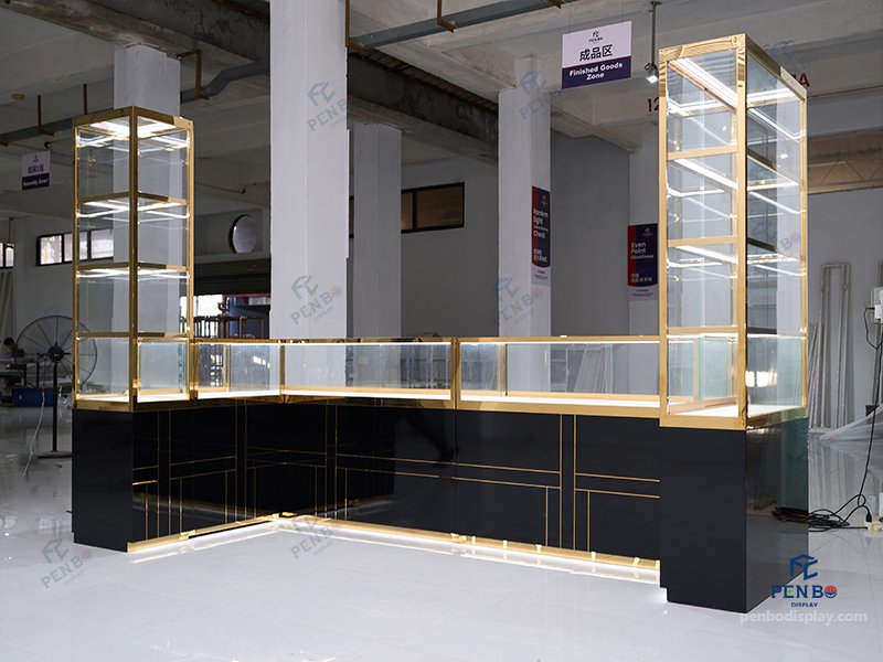 glass jewelry showcase for retail stores with gold frame and black bas