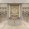 Central round glass jewelry showcases in boutique showroom, jewelry shop interior design