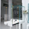 Tall white pedestal glass display cases for jewelry with built-in LED lights and locks