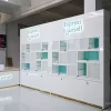 Wall-mounted jewelry display cabinets with lockable glass boxes and LED logo signage