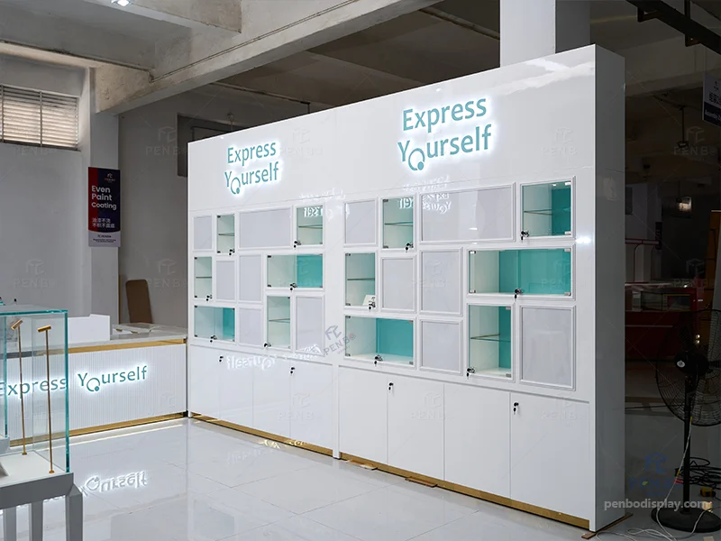 Wall-mounted jewelry display cabinets with lockable glass boxes and LED logo signage