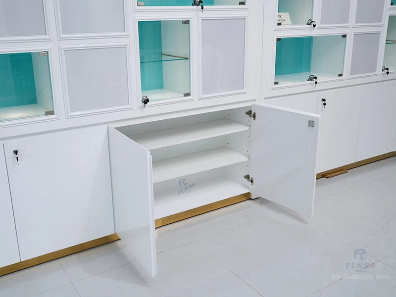 Wall-mounted jewelry display cabinets with lockable glass boxes and LED logo signage