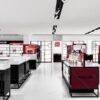 Modern makeup store interior design with wall display cabinets and tester counters