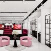 Makeup shop lounge area with product display shelving and modern retail layout