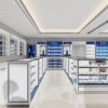 Modern jewelry retail interior featuring glass display cases