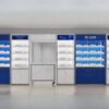 Wall-mounted jewelry display cabinets in a modern retail store