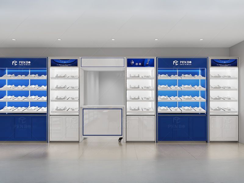 Wall-mounted jewelry display cabinets in a modern retail store