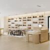 Luxury handbag store interior design with custom display cabinets