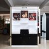 illuminated makeup wall display cabinet for cosmetic retail store