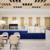 Modern café interior design with custom coffee shop fixtures and counter