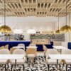 Modern café design featuring custom counters, display cabinets and premium interior finishes.