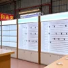Illuminated glass mobile phone display cabinets with lockable base storage