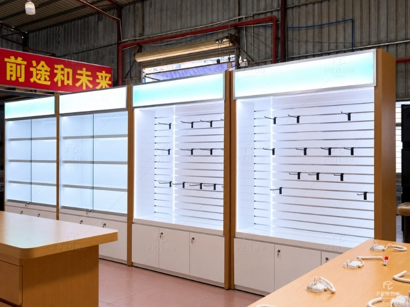 Illuminated glass mobile phone display cabinets with lockable base storage