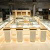 Luxury jewelry display counters with cream and gold finishes