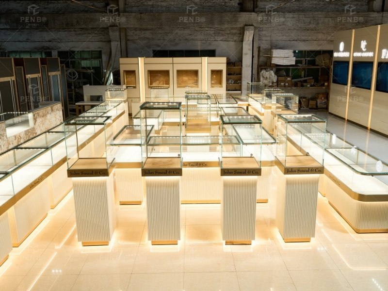 Luxury jewelry display counters with cream and gold finishes